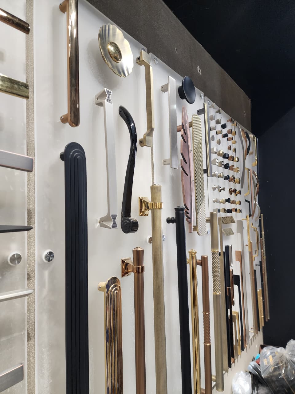 Wall of furniture handles and hardware samples