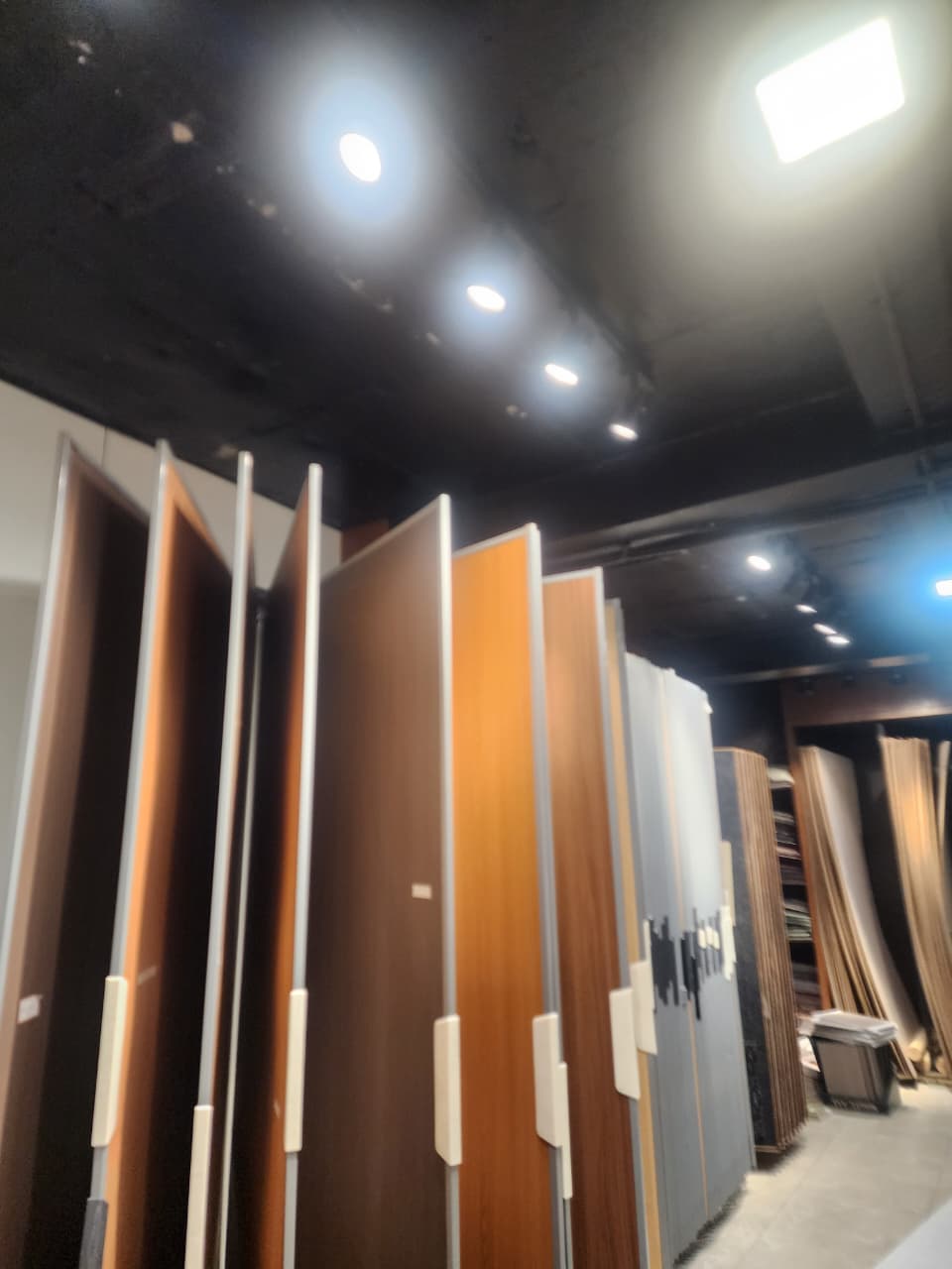 Laminate sample racks inside Lancer Plywood showroom